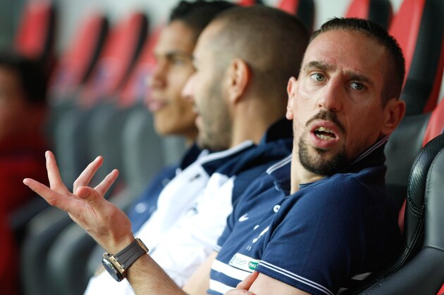 French soccer team forward Franck Ribery speaks with supporters before the friendly soccer match between France and Paraguay at the Allianz Riviera Stadium, in Nice, southeastern France, Sunday, Juin 1, 2014. France, which will face Paraguay on Sunday, is preparing for the upcoming soccer World Cup in Brazil starting on 12 June. (AP Photo/Claude Paris)