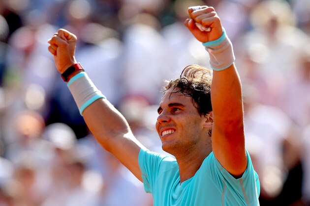 PARIS, FRANCE - JUNE 06:  Rafael Nadal of Spain celebrates victory in his men's singles match against Andy Murray of Great Britain on day thirteen of the French Open at Roland Garros on June 6, 2014 in Paris, France.  (Photo by Matthew Stockman/Getty Images)