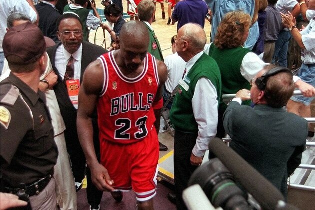 A dejected Chicago Bulls' Michael Jordan heads off the court following the Bulls' 78-73 loss to the Utah Jazz in Game 4 of the NBA Finals on Sunday, June 8, 1997, in Salt Lake City. The Jazz evened the series at 2-2. (AP Photo/ Douglas C. Pizac)
