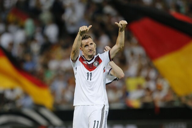 Germany's Miroslav Klose celebrates after a soccer friendly match between Germany and Armenia in the Coface Arena in Mainz, Germany, Friday, June 6, 2014.  Germany won 6-1. (AP Photo/Michael Probst)