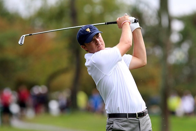 Oct 6, 2013; Dublin, OH, USA; Jordan Speith plays from the rough on the 11th fairway during the fourth round of the Presidents Cup at Muirfield Village Golf Club. Mandatory Credit: Allan Henry-USA TODAY Sports