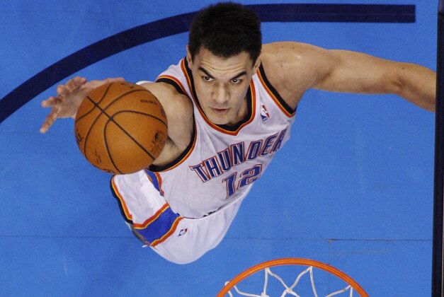 Oklahoma City Thunder center Steven Adams (12) reaches for a rebound against the San Antonio Spurs in the second quarter of Game 3 of an NBA basketball playoff series in the Western Conference finals, Sunday, May 25, 2014, in Oklahoma City. Oklahoma City won 106-97. (AP Photo/Sue Ogrocki)