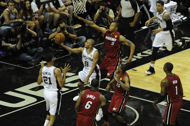 Jun 5, 2014; San Antonio, TX, USA; San Antonio Spurs guard Tony Parker (9) shoots against the Miami Heat in game one of the 2014 NBA Finals at AT&T Center. Mandatory Credit: Brendan Maloney-USA TODAY Sports