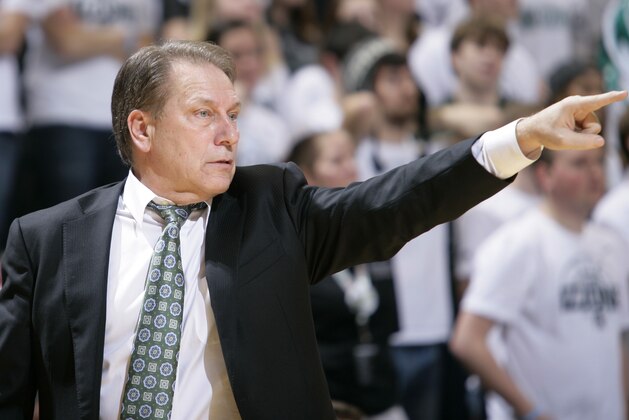 Michigan State coach Tom Izzo signals during the second half of an NCAA college basketball game against Ohio State, Tuesday, Jan. 7, 2014, in East Lansing, Mich. Michigan State won 72-68 in overtime. (AP Photo/Al Goldis)