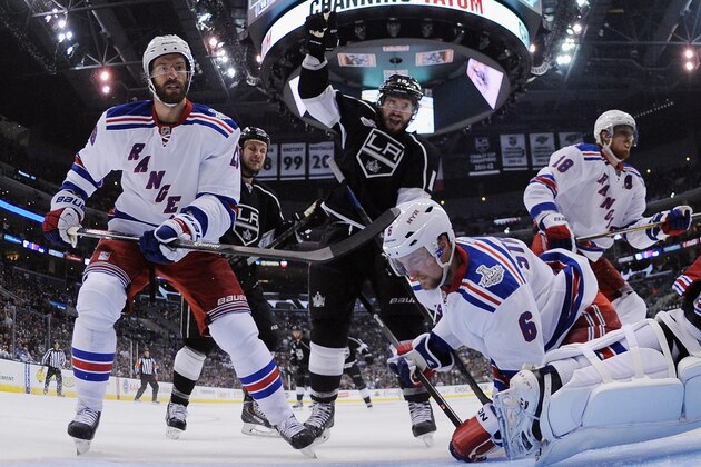 LOS ANGELES, CA - JUNE 04: Mike Richards #10 of the Los Angeles Kings celebrates the game-winning goal by Justin Williams as the Kings defeated the Rangers 3-2 in Game One of the 2014 NHL Stanley Cup Final at the Staples Center on June 4, 2014 in Los Angeles, California. (Photo by Bruce Bennett/Getty Images