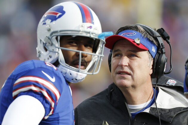 FILE - In this Nov. 17, 2013 file photo, Buffalo Bills head coach Doug Marrone, right, and Buffalo Bills quarterback EJ Manuel talk during the first half of an NFL football game against the New York Jets, in Orchard Park, N.Y.  Leaving the Bills defense to new coordinator Jim Schwartz, Marrone is making the retooled EJ Manuel-led offense his primary focus during the team's spring minicamp sessions.(AP Photo/Gary Wiepert, File)