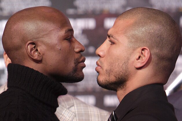 Boxers Floyd Mayweather, left, and Miguel Cotto face-off during a news conference in New York, Tuesday, Feb. 28, 2012. Cotto and Mayweather will fight in Las Vegas on May 5, 2012 for Cotto's WBA World super welterweight title.. (AP Photo/Seth Wenig) Boxers Floyd Mayweather, left, and Miguel Cotto face-off during a news conference in New York, Tuesday, Feb. 28, 2012. Cotto and Mayweather will fight in Las Vegas on May 5, 2012 for Cotto's WBA World super welterweight title.. (AP Photo/Seth Wenig)