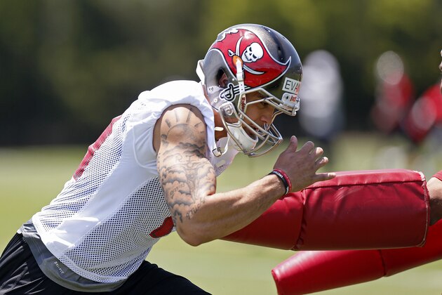 TAMPA, FL - MAY 16:  Wide Receiver Mike Evans #13 of the Tampa Bay Buccaneers works out during the first day of rookie minicamp on May 16, 2014 at One Buc Place in Tampa, Florida.  (Photo by Brian Blanco/Getty Images)