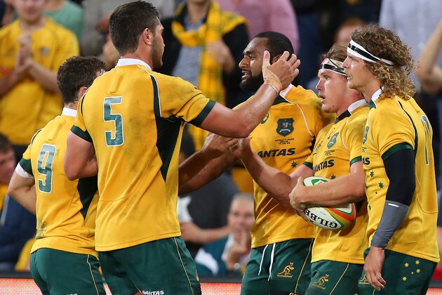 BRISBANE, AUSTRALIA - JUNE 07:  Michael Hooper of the Wallabies celebrates a try with team mates during the First International Test Match between the Australian Wallabies and France at Suncorp Stadium on June 7, 2014 in Brisbane, Australia.  (Photo by Chris Hyde/Getty Images)