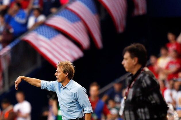 KANSAS CITY, KS - OCTOBER 16:  Head coach Jurgen Klinsmann of the USA coaches alongside head coach Ever Hugo Almeida of Guatemala during the World Cup Qualifying match at LiveStrong Sporting Park on October 16, 2012 in Kansas City, Kansas.  (Photo by Jamie Squire/Getty Images)