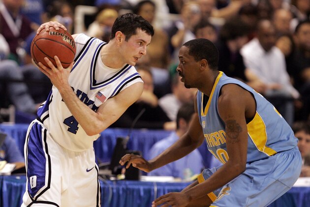 GREENSBORO, NC - MARCH 16:  J.J. Redick #4 of the Duke Blue Devils is guarded by Alvin Mott #30 of the Southern University Jaguars during the First Round of the 2006 NCAA Men's Basketball Tournament on March 16, 2006 at the Greensboro Coliseum in Greensboro, North Carolina.  (Photo by Streeter Lecka/Getty Images)