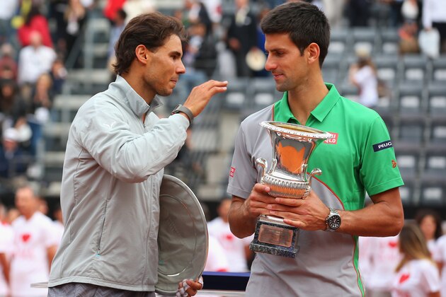 ROME, ITALY - MAY 18:  Novak Djokovic of Serbia with the winners trophy next to runner up Rafael Nadal of Spain after the final during day eight of the Internazionali BNL d'Italia tennis 2014 on May 18, 2014 in Rome, Italy.  (Photo by Julian Finney/Getty Images)