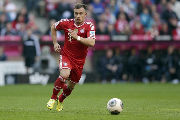 Bayern's Xherdan Shaqiri of Switzerland controls the ball during the German first division Bundesliga soccer match between FC Bayern Munich and TSG 1899 Hoffenheim, in Munich, southern Germany, Saturday, March 29, 2014. (AP Photo/Matthias Schrader)
