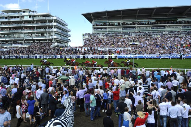 EPSOM, ENGLAND - JUNE 07: Frankie Dettori riding Baitha Alga (L) win The Investec Woodcote Stakes at Epsom racecourse on June 07, 2014 in Epsom, England. (Photo by Alan Crowhurst/Getty Images)