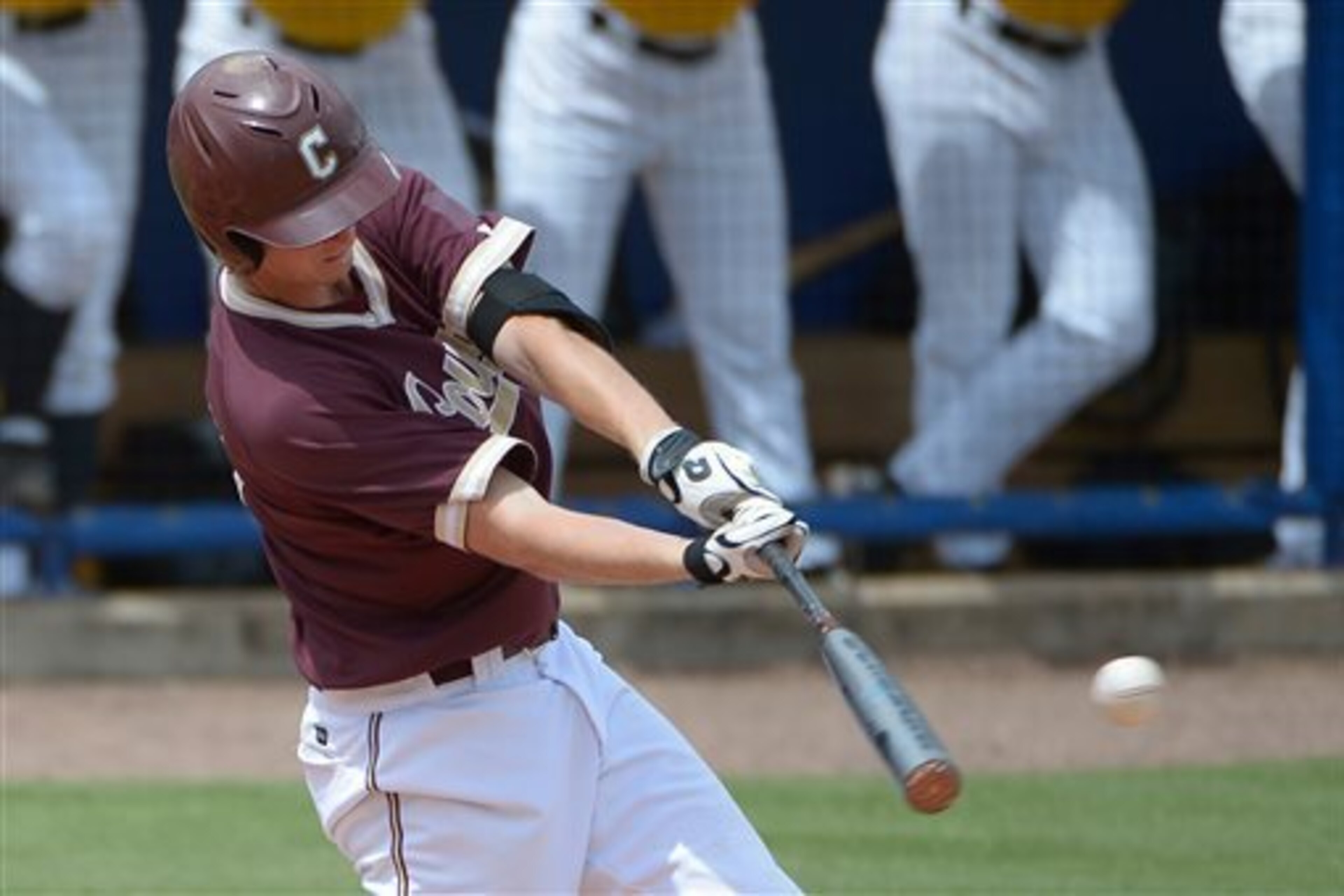 College of Charleston’s Blake Butler hits a double in the regional clincher against Long Beach State on Monday.