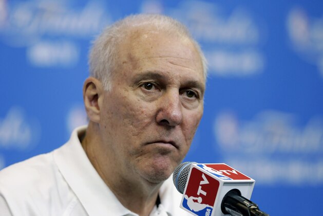 San Antonio Spurs head coach Gregg Popovich listens to a question during a news conference on Saturday, June 7, 2014, in San Antonio. The team plays Game 2 of the NBA Finals against the Miami Heat on Sunday. (AP Photo/Eric Gay)