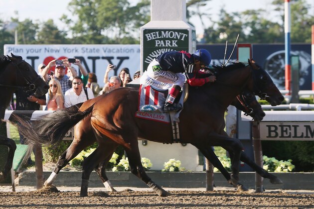 ELMONT, NY - JUNE 07:  Tonalist #11, ridden by Joel Rosario, races to the finish line enroute to winning the 146th running of the Belmont Stakes at Belmont Park on June 7, 2014 in Elmont, New York.  (Photo by Travis Lindquist/Getty Images)