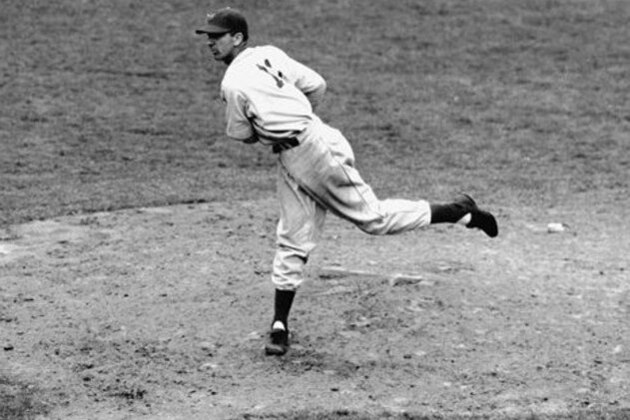 Pictured here is Carl Hubbell, Star Giant left hander, breezing one through as he saw his first service in the 1939 season against the Cubs at New York, May 8, 1934. Hubbell pitched for two innings as a relief pitcher and didn't yield a hit. (AP Photo/Tom Sande)