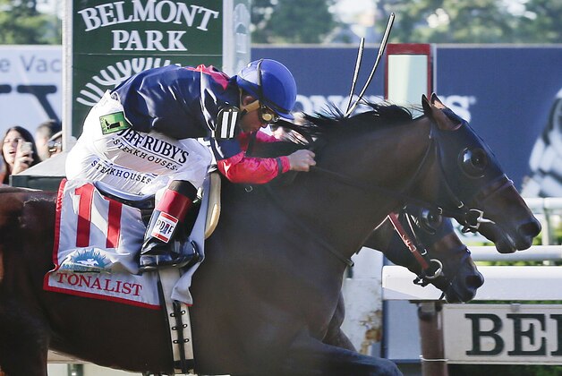 Tonalist (11) with Joel Rosario up edges out Commissioner with Javier Castellano up to win the 146th running of the Belmont Stakes horse race, Saturday, June 7, 2014, in Elmont, N.Y. Belmont Stakes horse race, Saturday, June 7, 2014, in Elmont, N.Y. (AP Photo/Peter Morgan)