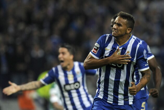 FC Porto's Danilo Silva, from Brazil, celebrates after scoring his side's second goal against Sporting in a Portuguese League soccer match at the Dragao stadium in Porto, Portugal, Sunday Oct. 27, 2013. (AP Photo/Paulo Duarte)