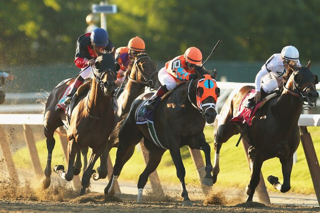 ELMONT, NY - JUNE 07: Tonalist #11 (L), ridden by Joel Rosario, rounds the final turn on his way to winning the 146th running of the Belmont Stakes at Belmont Park on June 7, 2014 in Elmont, New York. (Photo by Mike Ehrmann/Getty Images) ELMONT, NY - JUNE 07: Tonalist #11 (L), ridden by Joel Rosario, rounds the final turn on his way to winning the 146th running of the Belmont Stakes at Belmont Park on June 7, 2014 in Elmont, New York. (Photo by Mike Ehrmann/Getty Images)