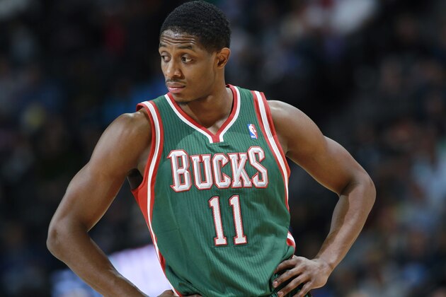 Milwaukee Bucks guard Brandon Knight looks on against the Denver Nuggets in the fourth quarter of the Nuggets' 110-100 victory in an NBA basketball game in Denver on Wednesday, Feb. 5, 2014. (AP Photo/David Zalubowski)