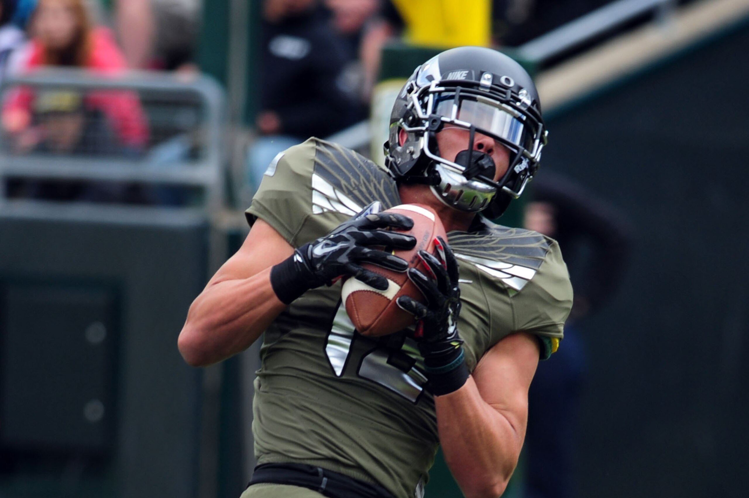 EUGENE, OR - MAY 3: Wide receiver Devon Allen #13 of the Oregon Ducks catches a touchdown pass during the spring game at Autzen Stadium on May 3, 2014 in Eugene, Oregon. (Photo by Steve Dykes/Getty Images)