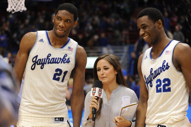 Feb 22, 2014; Lawrence, KS, USA; Kansas Jayhawks center Joel Embiid (21) and guard Andrew Wiggins (22) speak with media after the game against the Texas Longhorns at Allen Fieldhouse. Kansas won 85-54. Mandatory Credit: Denny Medley-USA TODAY Sports