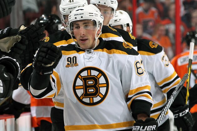 PHILADELPHIA, PA - MARCH 30:  Brad Marchand #63 of the Boston Bruins celebrates Andrej Meszaros's goal against the Philadelphia Flyers on March 30, 2014 at the Wells Fargo Center in Philadelphia, Pennsylvania.  (Photo by Len Redkoles/NHLI via Getty Images)