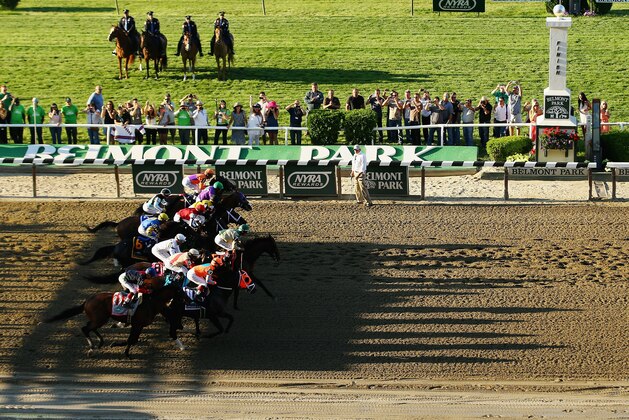 ELMONT, NY - JUNE 07:  The field starts the 146th running of the Belmont Stakes at Belmont Park on June 7, 2014 in Elmont, New York.  (Photo by Al Bello/Getty Images)