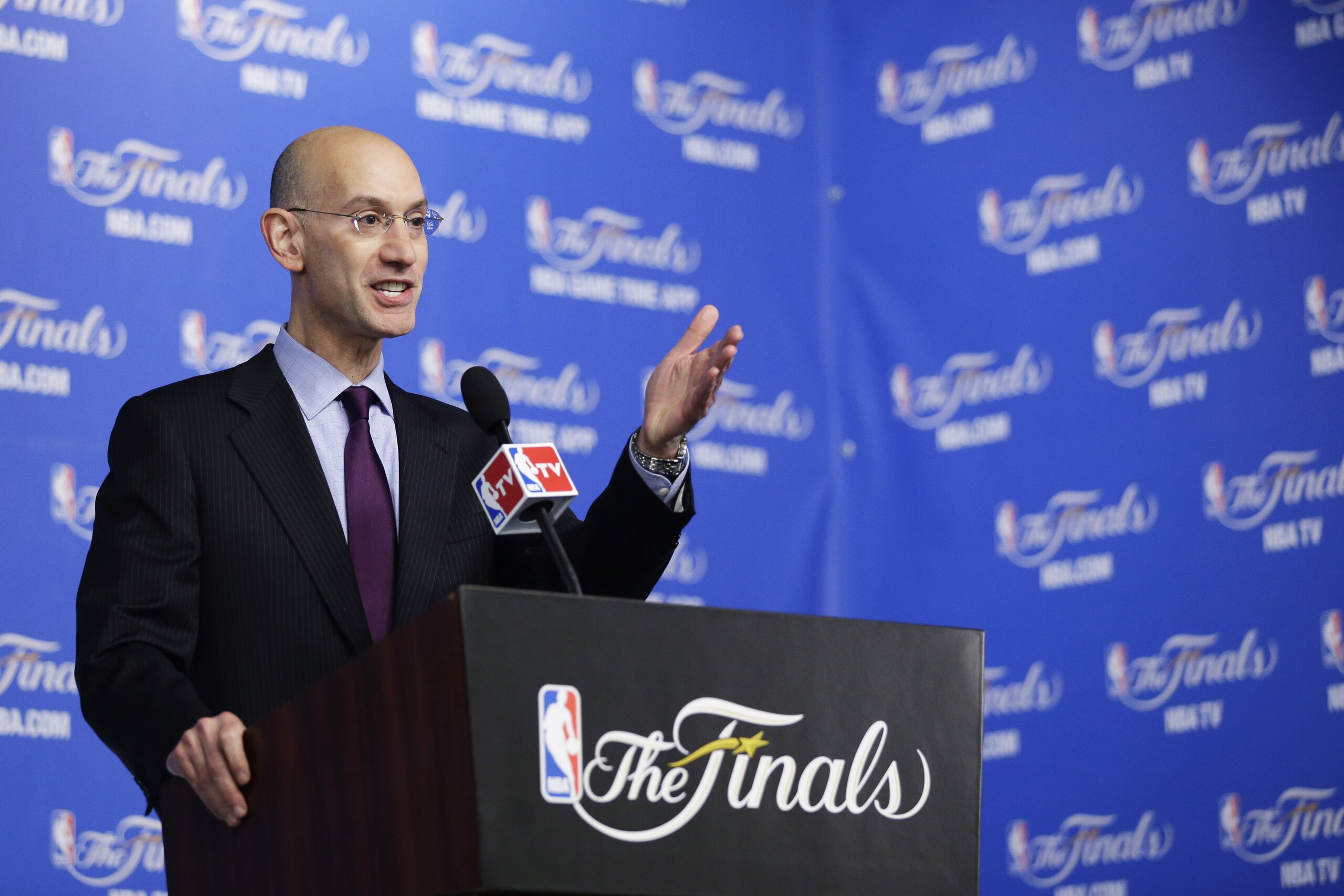 NBA Commissioner Adam Silver speaks during a news conference before Game 2 of the NBA basketball finals between the San Antonio Spurs and the Miami Heat on Sunday, June 8, 2014, in San Antonio. (AP Photo/Tony Gutierrez)