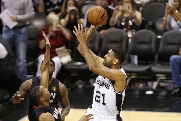 SAN ANTONIO, TX - JUNE 8: Tim Duncan #21 of the San Antonio Spurs shoots the ball against the Miami Heat during Game Two of the 2014 NBA Finals on June 8, 2014 at AT&T Center in San Antonio, Texas. NOTE TO USER: User expressly acknowledges and agrees that, by downloading and or using this photograph, User is consenting to the terms and conditions of the Getty Images License Agreement. Mandatory Copyright Notice: Copyright 2014 NBAE (Photo by Joe Murphy/NBAE via Getty Images) SAN ANTONIO, TX - JUNE 8: Tim Duncan #21 of the San Antonio Spurs shoots the ball against the Miami Heat during Game Two of the 2014 NBA Finals on June 8, 2014 at AT&T Center in San Antonio, Texas. NOTE TO USER: User expressly acknowledges and agrees that, by downloading and or using this photograph, User is consenting to the terms and conditions of the Getty Images License Agreement. Mandatory Copyright Notice: Copyright 2014 NBAE (Photo by Joe Murphy/NBAE via Getty Images)
