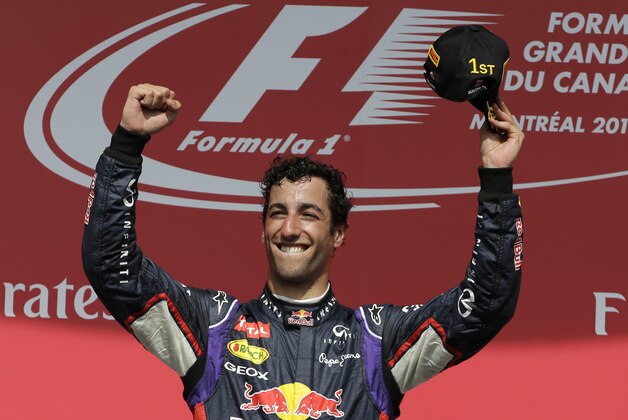 Red Bull driver Daniel Ricciardo, from Australia, celebrates after winning the Canadian Grand Prix Sunday, June 8, 2014, in Montreal. (AP Photo/David J. Phillip)