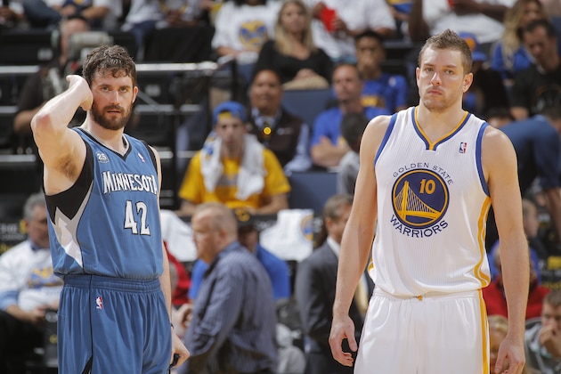 OAKLAND, CA - APRIL 14: Kevin Love #42 (left) of the Minnesota Timberwolves and David Lee #10 (right) of the Golden State Warriors during a game on April 14, 2014 at Oracle Arena in Oakland, California. NOTE TO USER: User expressly acknowledges and agrees that, by downloading and or using this photograph, user is consenting to the terms and conditions of Getty Images License Agreement. Mandatory Copyright Notice: Copyright 2014 NBAE (Photo by Rocky Widner/NBAE via Getty Images)