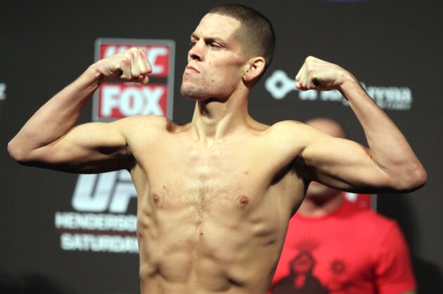 Nate Diaz is seen at the weigh in before his mixed martial arts bout at a UFC on FOX 5 event in Seattle, Friday, Dec. 7, 2012. (AP Photo/Gregory Payan)