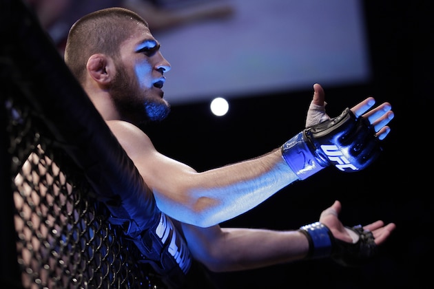 Khabib Nurmagomedov, from Russia, celebrates after Thiago Tavares, from Brazil,  during their lightweight mixed martial arts bout at the Ultimate Fighting Championship (UFC) in Sao Paulo, Brazil, Saturday, Jan. 19, 2013. (AP Photo/Andre Penner)