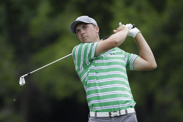 Jordan Spieth watches his tee shot on the fourth hole hole during the second round of the PGA Colonial golf tournament in Fort Worth, Texas, Friday, May 23, 2014.   (AP Photo/LM Otero)