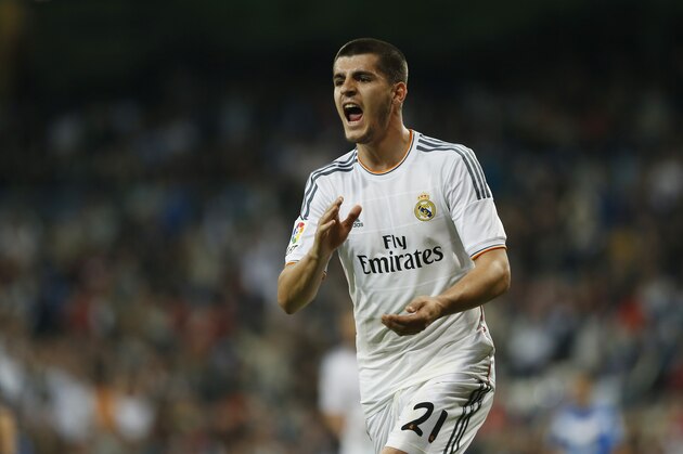 Real's Alvaro Morata celebrates his goal during a Spanish La Liga soccer match between Real Madrid and Almeria at the Santiago Bernabeu  stadium in Madrid, Spain, Saturday, April 12, 2014. (AP Photo/Andres Kudacki)