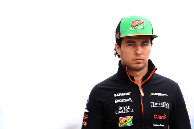 MONTREAL, QC - JUNE 05:  Sergio Perez of Mexico and Force India walks across the paddock ahead of the Canadian Formula One Grand Prix at Circuit Gilles Villeneuve on June 5, 2014 in Montreal, Canada.  (Photo by Mark Thompson/Getty Images)