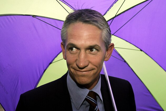 Former England soccer captain and now BBC sports presenter Gary Lineker arrives at the High Court in London, Wednesday, June 15, 2005.  Lineker is being sued for libel by Australian striker Harry Kewell over a newspaper article published in 2003 about the player's transfer from Leeds to Liverpool.  (AP Photo/Matt Dunham)