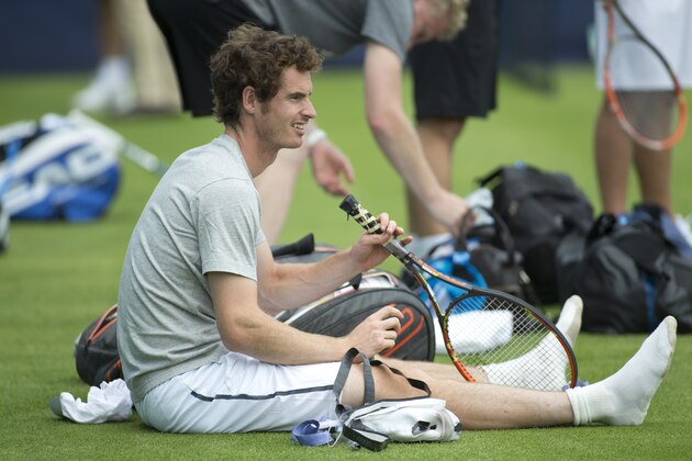 Britain's Andy Murray takes part in a training session for the Queen's Club grass court tennis tournament in London, Monday June, 9, 2014. Murray plays Wednesday. (AP Photo/Alastair Grant)