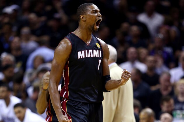 SAN ANTONIO, TX - JUNE 08: Chris Bosh #1 of the Miami Heat reacts against the San Antonio Spurs during Game Two of the 2014 NBA Finals at the AT&T Center on June 8, 2014 in San Antonio, Texas. The Miami Heat defeated the San Antonio Spurs 98-96. NOTE TO USER: User expressly acknowledges and agrees that, by downloading and or using this photograph, User is consenting to the terms and conditions of the Getty Images License Agreement. (Photo by Andy Lyons/Getty Images) SAN ANTONIO, TX - JUNE 08: Chris Bosh #1 of the Miami Heat reacts against the San Antonio Spurs during Game Two of the 2014 NBA Finals at the AT&T Center on June 8, 2014 in San Antonio, Texas. The Miami Heat defeated the San Antonio Spurs 98-96. NOTE TO USER: User expressly acknowledges and agrees that, by downloading and or using this photograph, User is consenting to the terms and conditions of the Getty Images License Agreement. (Photo by Andy Lyons/Getty Images)
