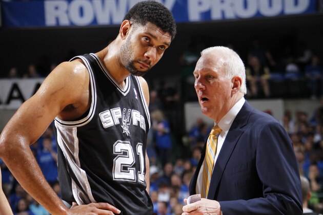 DALLAS, TX - APRIL 26: Gregg Popovich of the San Antonio Spurs talks to Tim Duncan #21 during the game against the Dallas Mavericks during Game Three of the Western Conference Quarterfinals during the 2014 NBA Playoffs on April 26, 2014 at the American Airlines Center in Dallas, Texas. NOTE TO USER: User expressly acknowledges and agrees that, by downloading and/or using this Photograph, user is consenting to the terms and conditions of the Getty Images License Agreement. Mandatory Copyright Notice: Copyright 2013 NBAE (Photo by Glenn James/NBAE via Getty Images) DALLAS, TX - APRIL 26: Gregg Popovich of the San Antonio Spurs talks to Tim Duncan #21 during the game against the Dallas Mavericks during Game Three of the Western Conference Quarterfinals during the 2014 NBA Playoffs on April 26, 2014 at the American Airlines Center in Dallas, Texas. NOTE TO USER: User expressly acknowledges and agrees that, by downloading and/or using this Photograph, user is consenting to the terms and conditions of the Getty Images License Agreement. Mandatory Copyright Notice: Copyright 2013 NBAE (Photo by Glenn James/NBAE via Getty Images)