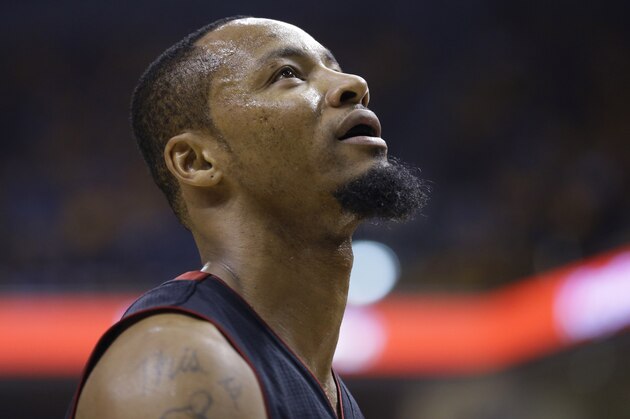 Miami Heat forward Rashard Lewis watches a replay screen during the second half against the Indiana Pacers in Game 5 of the NBA basketball Eastern Conference finals in Indianapolis, Wednesday, May 28, 2014. (AP Photo/Michael Conroy)