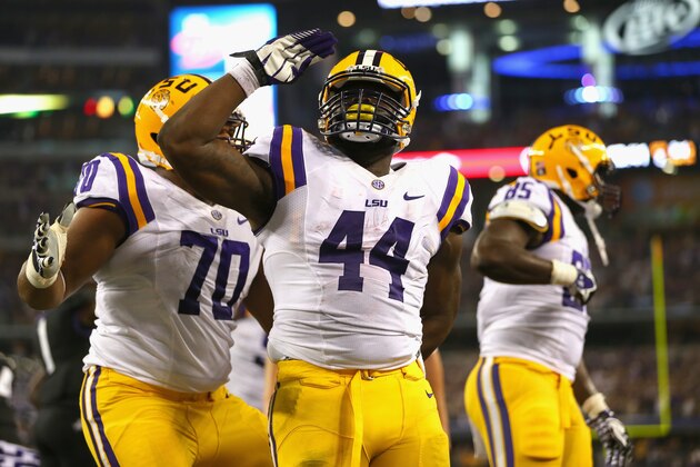 ARLINGTON, TX - AUGUST 31:  J.C. Copeland #44 of the LSU Tigers celebrates a touchdown against the TCU Horned Frogs at AT&T Stadium on August 31, 2013 in Arlington, Texas.  (Photo by Ronald Martinez/Getty Images)