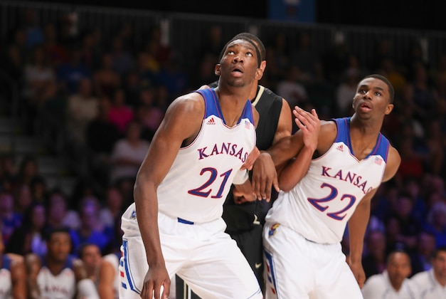 Nov 28, 2013; Paradise Island, BAHAMAS; Kansas Jayhawks center Joel Embiid (21) and guard Andrew Wiggins (22) look to rebound during the game against the Wake Forest Demon Deacons at the 2013 Battle 4 Atlantis in the Imperial Arena at the Atlantis Resort. Mandatory Credit: Kevin Jairaj-USA TODAY Sports