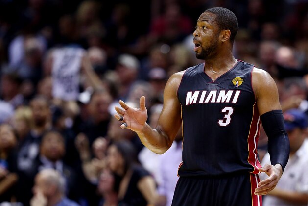 SAN ANTONIO, TX - JUNE 08: Dwyane Wade #3 of the Miami Heat reacts against the San Antonio Spurs during Game Two of the 2014 NBA Finals at the AT&T Center on June 8, 2014 in San Antonio, Texas. NOTE TO USER: User expressly acknowledges and agrees that, by downloading and or using this photograph, User is consenting to the terms and conditions of the Getty Images License Agreement.  (Photo by Andy Lyons/Getty Images)