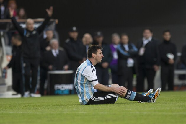 Argentina's Lionel Messi reacts after being fouled during an international friendly soccer match against Slovenia in La Plata, Argentina, Saturday, June 7, 2014. Argentina is leaving June 9 for Brazil to compete in the World Cup. (AP Photo/Eduardo Di Baia) Argentina's Lionel Messi reacts after being fouled during an international friendly soccer match against Slovenia in La Plata, Argentina, Saturday, June 7, 2014. Argentina is leaving June 9 for Brazil to compete in the World Cup. (AP Photo/Eduardo Di Baia)