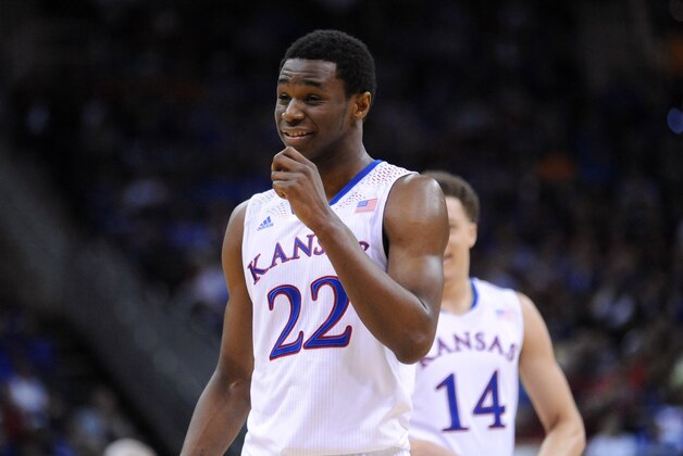 Mar 13, 2014; Kansas City, MO, USA; Kansas Jayhawks guard Andrew Wiggins (22) laughs while on the foul line during the second half against the Oklahoma State Cowboys in the second round of the Big 12 Conference college basketball tournament at Sprint Center. Kansas won 77-70 in overtime. Mandatory Credit: Denny Medley-USA TODAY Sports