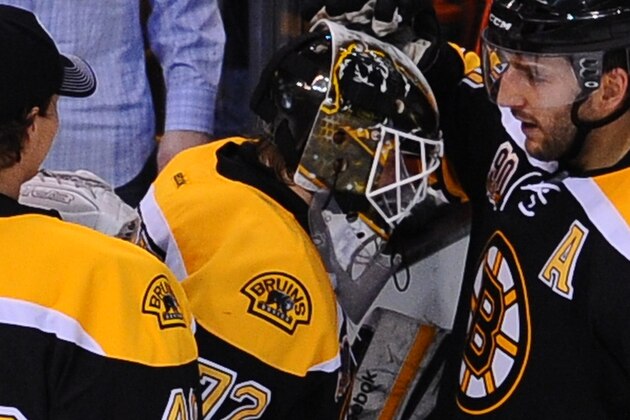 BOSTON, MA - JANUARY 2: Niklas Svedberg #72 of the Boston Bruins celebrates his first NHL win with teammates Tuukka Rask #40 and Patrice Bergeron #37 after the game against the Nashville Predators at the TD Garden on January 2, 2014 in Boston, Massachusetts.  (Photo by Steve Babineau/NHLI via Getty Images)